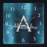 Blåmodern Elegant Metallic Monogram Namn Fyrkantig Klocka<br><div class="desc">Modern och Elegant Blue Faux Stainless Steel Foil Monogram Namn och första Personlig Anpassningsbar Wall Clock. Wall Clock ger perfekten till någon som kärlek trendig chic metallisk deka till ge som julgåva eller födelsedagspresent.</div>