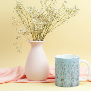 Blått antikt blommönster benporslin mugg