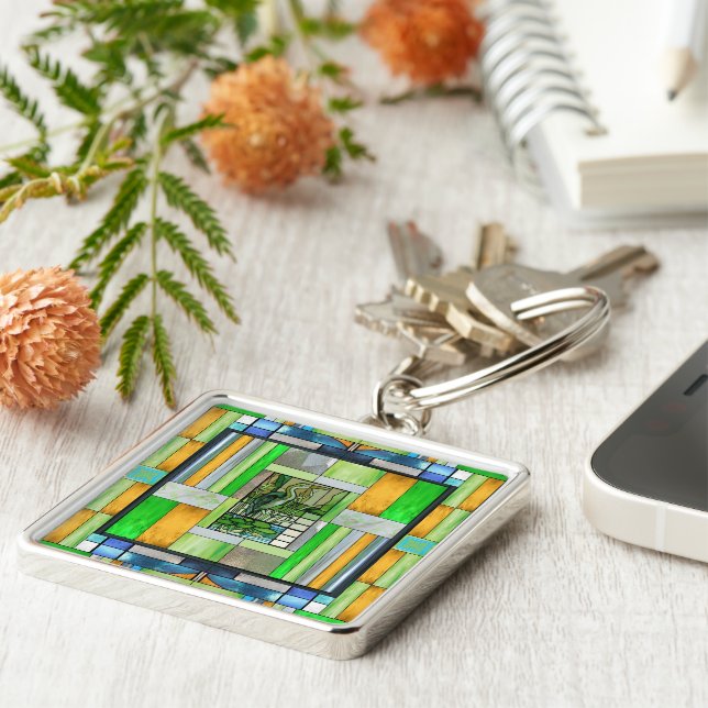 Blått heron, glasaktigt fyrkantig silverfärgad nyckelring (Sidan)