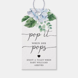 Blått Hydrangea poppar det när hon trycker på favo Presentetikett