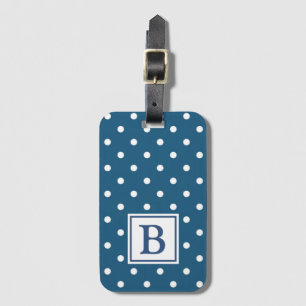 Blått- och vitpolkaen pricker monogramen bagagebricka