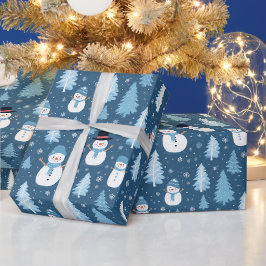 Blått snögubbe-julklapp som omsluter presentpapper