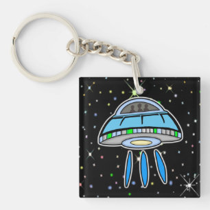 Blått UFO med Rymden-nyckelkedjan i Starry night