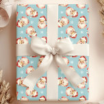 Blått Vintage Jultomten Ansikte vattenfärg Presentpapper<br><div class="desc">Backa dina gåvor i festiv tjusning med vår blåa Vintage Jultomten Ansikte Watercolor Wrapping Papper! Den här charmerande designen har nostalgiska vattenfärgbilder av Jultomten ansikte som ställs mot en livfull bakgrund, som är försedd med delikat snöflingor. Perfekt för att lägga till ett litet vintage charm till presenter i helgdag. Den...</div>