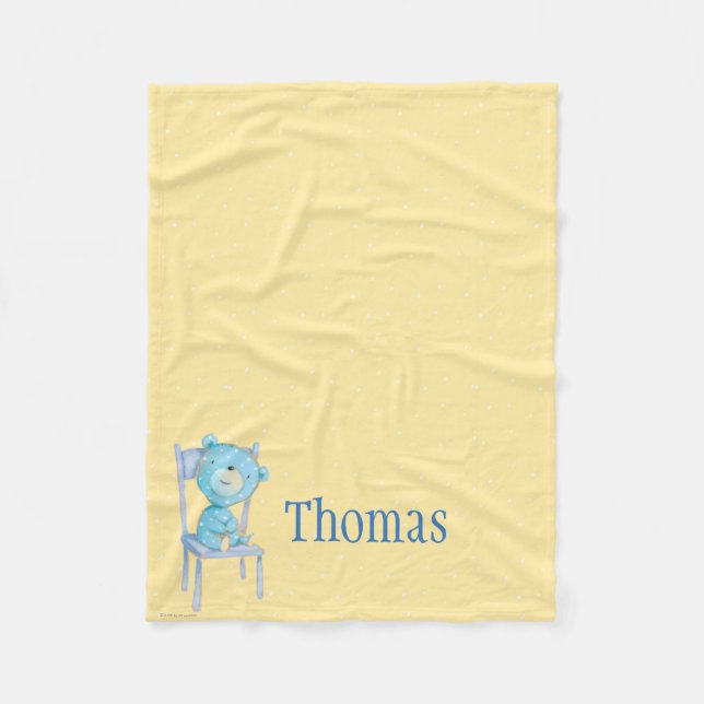 BlåttCalicobjörn som ler på stol Fleecefilt (Framsidan)