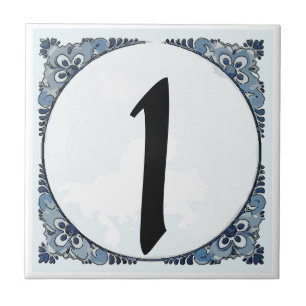 Blåttgränsen belägger med tegel, huset numrerar, kakelplatta