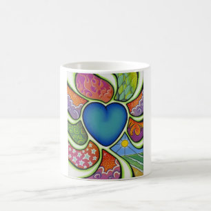 Blåtthjärta av kärlekmug.en kaffemugg