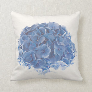 Blåttrundavanlig hortensia samla i en klunga på kudde