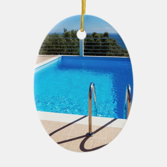 Blåttsimbassängen med kliver på havet julgransprydnad keramik (Framsidan)