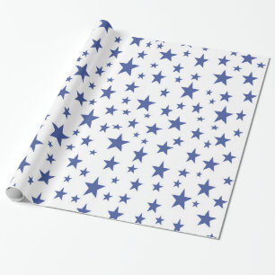 Blåttstjärnor som slår in papper presentpapper