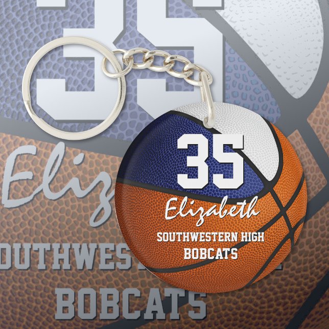 Blåvitt team färg spelar som en flickbasketboll (Skapare uppladdad)