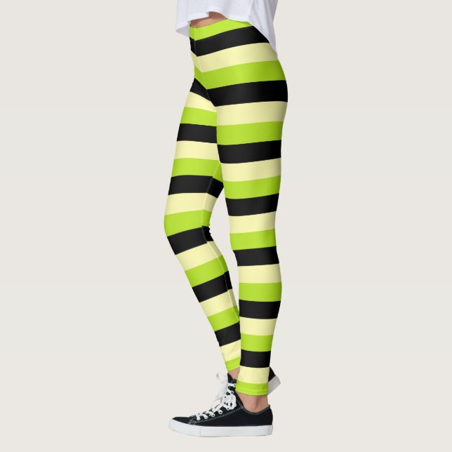 Blek - gult, limefruktgrönt och svartrandar leggings (Vänster)