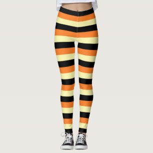 Blek - gult-, svart- och orangerandar leggings