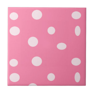 Blek rosa polka dots på rosa kakelplatta