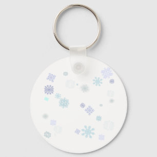 Blek snöflingor nyckelring