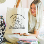 Blekande Klubb för Blommigt Bok Personlig Bok Tygkasse<br><div class="desc">Denna vackra utformning av anpassadet för bok älskare, bokmaskar, författare, författare, vänner till bok klubben eller levande läsare har en linje som illustrerar ett öppet maskintäcke bok med blommor, löv och stjärnor som blåser från ryggraden. Anpassa med en textrad med anpassningsbar överst; perfekt för bok klubb namn, bokbutik eller evenemangets...</div>