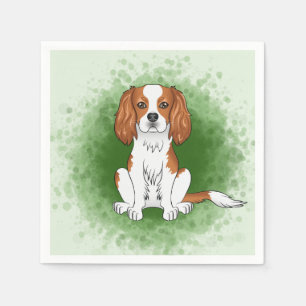 Blenheim Cavalier King Charles Spaniel på grön bak Pappersservett