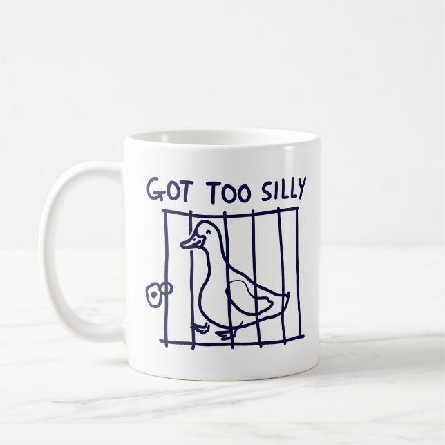 "Blev för dum" Anka i bur-mugg Kaffemugg (Vänster)