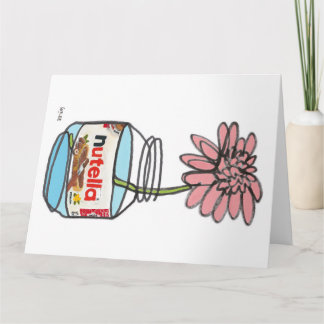 Blodnära sammanhängande nötskal och blommor kort