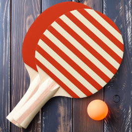 Blodorange poloskstrippar och enfärgade pingisracket