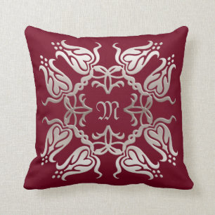 blom- damastast guld- element.monogram. kudde