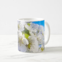 Blomande gren av päron kaffemugg