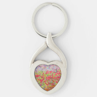 blommande röd ros twisted heart silverfärgad nyckelring