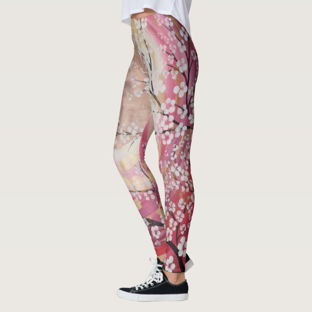 Blommar den guld- rosa sakura för solen leggings (Vänster)
