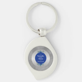 Blommar och Blommigt i Metallic Silver Swirl Silverfärgad Nyckelring