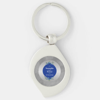 Blommar och Blommigt i Metallic Silver Swirl Silverfärgad Nyckelring