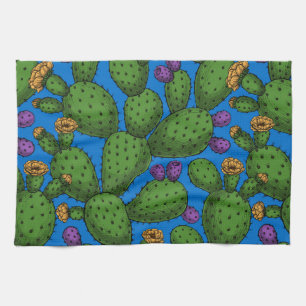 Blommar opuntia på blå kökshandduk