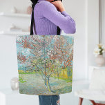Blommar Peach Träd | Vincent van Gogh Tygkasse<br><div class="desc">Blommar Peach Träd (1888),  av den nederländske postimponerande konstnären Vincent van Gogh. Originalteckningen är en olja på arbetsytan som skildrar ett vackert landskap av blomstrande rosa träd. Använda verktygen för att lägga till anpassningsbar eller anpassa bilden.</div>