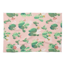 Blommarkaktus på rosa bakgrundskök