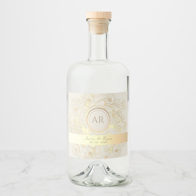 Blommig guldmonogram bröllop spritflaskor etikett (Framsida)