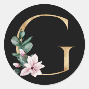 Blommig magnolia-monogram i guld bokstav G Runt Klistermärke