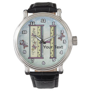 blommig Monogram H Armbandsur