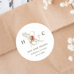Blommigt Ampersand Elegant bröllop Tack Runt Klistermärke<br><div class="desc">Tack vare elegant bröllop har du ett klistermärke med en smak med vattenfärgade blommor i vitt,  grönt och terracotta,  med initialer. Om du vill ha en mer avancerad anpassning av den här designen klickar du på BLUE DESIGN VERKTYG ovan! Matchande objekt är också tillgängliga.</div>