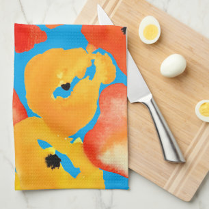 Blommigt av rödspätta och orange kökshandduk