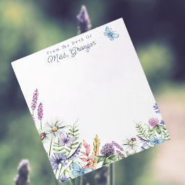 Blommigt av vattenfärg från lärarskrivbordet anteckningsblock
