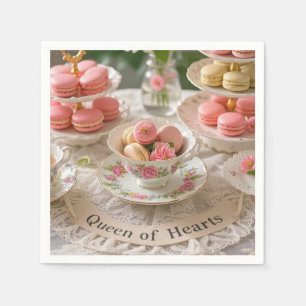 Blommigt bord, tekopp, skiktade brickor macarons Q Pappersservett