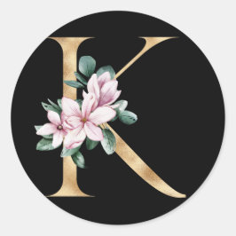 Blommigt magnolia monogram i guld brev K Runt Klistermärke