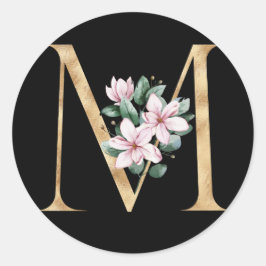 Blommigt magnolia monogram i guld brev M Runt Klistermärke
