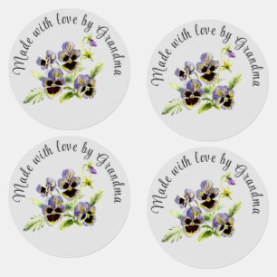 Blommigt om söt som gjorts av etiketter från Järn-