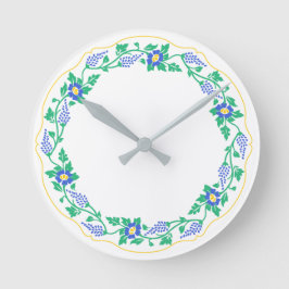 Blommigt oval rund klocka