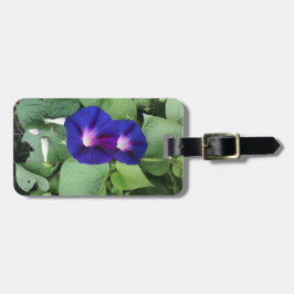 Blommigt- resgodsmärkning med läderband bagagebricka