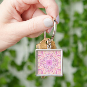 Blommigtar i trädgård i rosa fyrkantig silverfärgad nyckelring