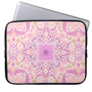 Blommigtar i trädgård i rosa laptop fodral