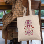 Blommigten magentor och Blommar Tygkasse<br><div class="desc">Boho och rustik tote-väska med hand plockade som illustration av knärör och blommor i magneta.</div>