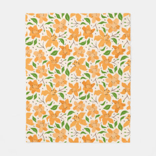 blommönster av orange och grönt lövs fleecefilt
