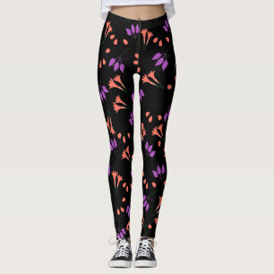 blommönster för orange och lila på svart leggings